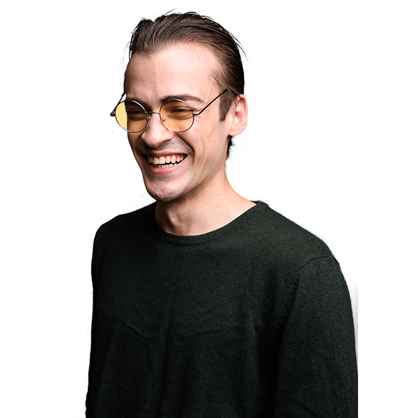 young-handsome-man-laughing-against-gray-studio-ba-NAFMGMSa.png